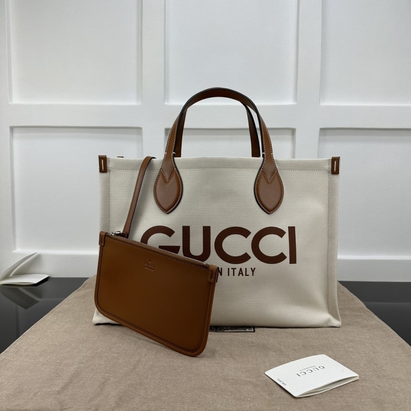 G*u*i shopping bags